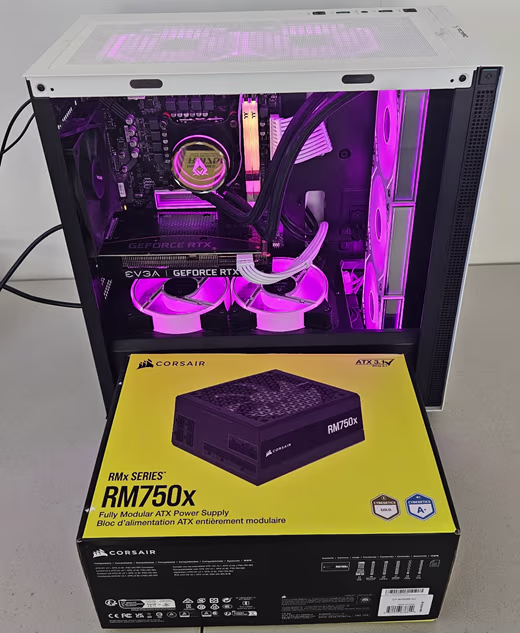 Gaming computer repair in Fulham Gardens : a new PSU being fitted inside a high-performance PC case.
